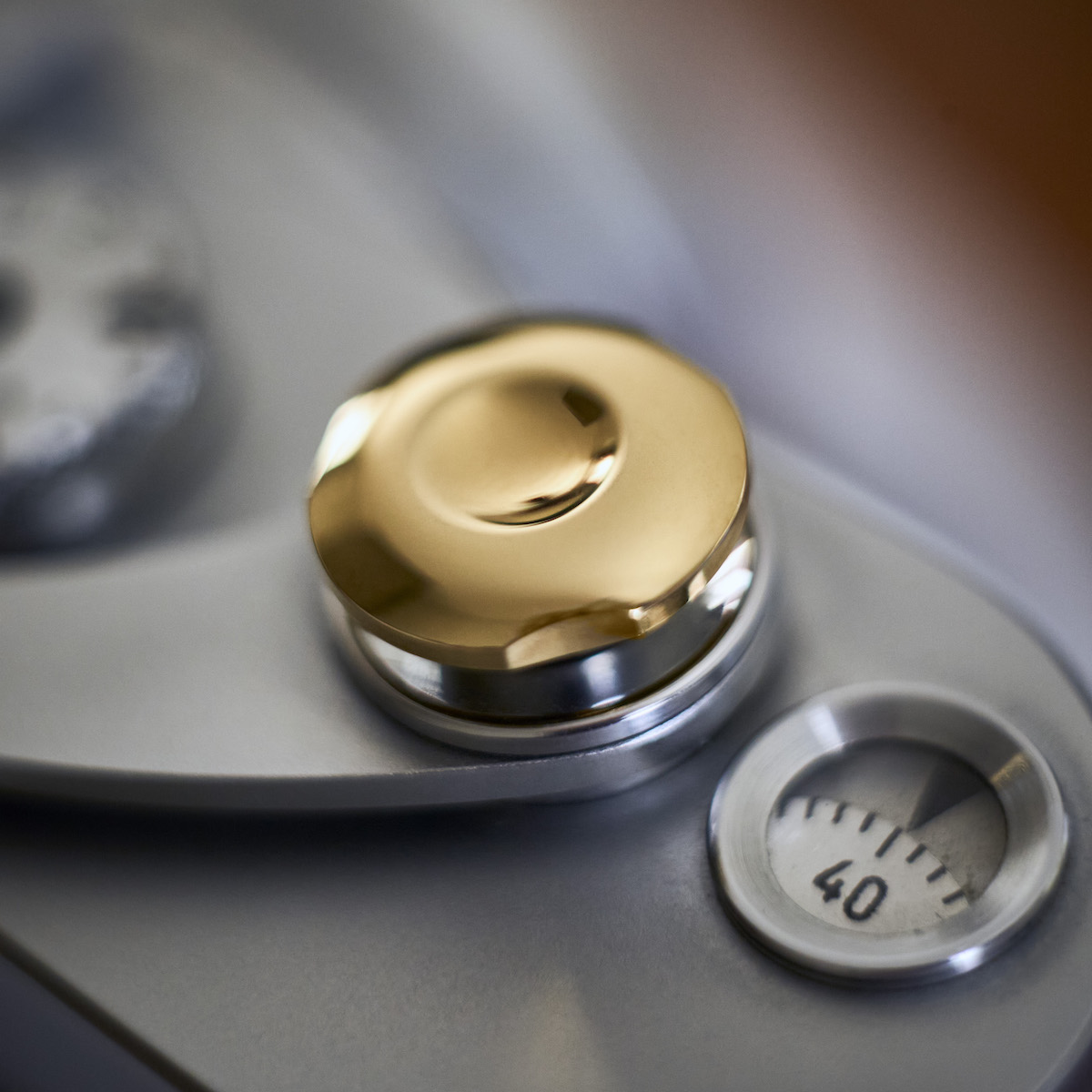 New Komaru polished brass limited edition soft-release button released -  Leica Rumors